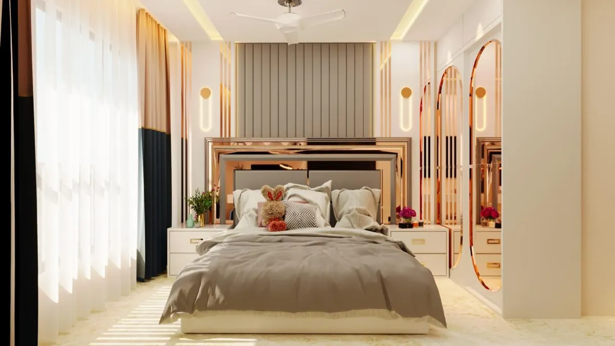Bedroom with fluted headboard wall, oval sconces and rose-gold arched mirrors