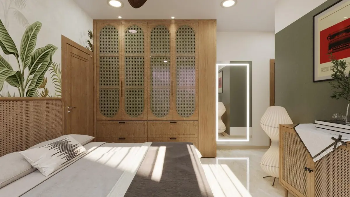 Bedroom with an oak and cane-arched wardrobe, rattan headboard and botanical mural