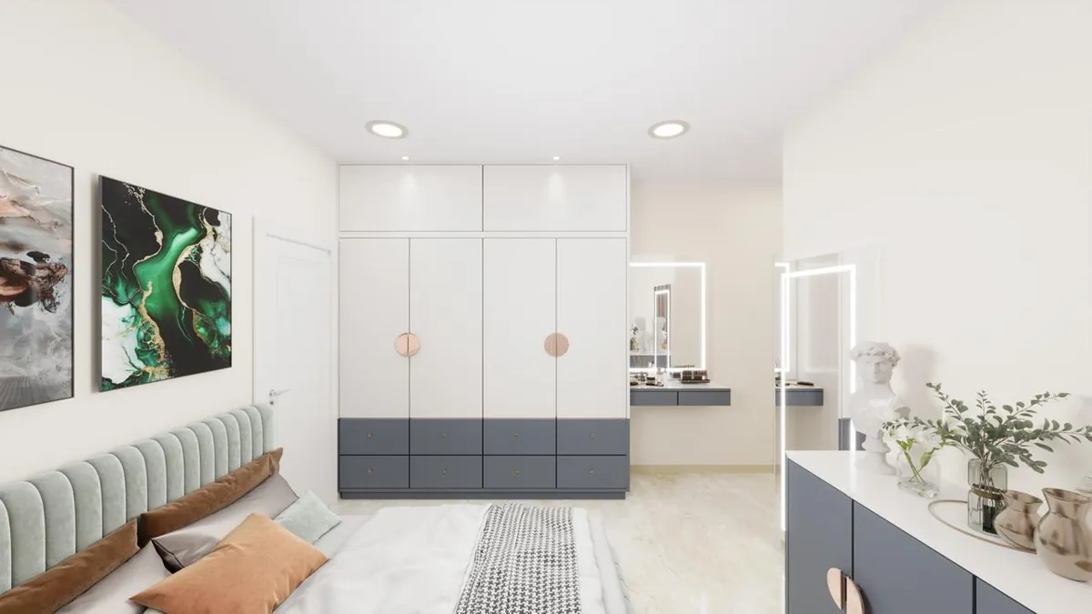 White and slate-grey wardrobe with rose-gold handles and a backlit dressing mirror